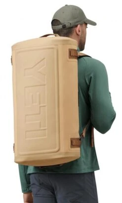 YETI Panga 50 L Waterproof Duffel 17 YETI Panga 50 L Waterproof Duffel -Fishing Specialty Store YETI Panga 50 L Waterproof Duffel SKU 0504 TAN site studio panga 50l duffel tan on body 00130 b primary b 2400x2400 79f09aac b951 4036 8dde 969a5742a572 1024x1024@2x